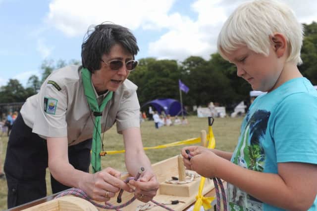 Tying knots - Funtington and West Stoke Scout group's Clare Hoskings and Harry Bennett, eight LA150054-3
