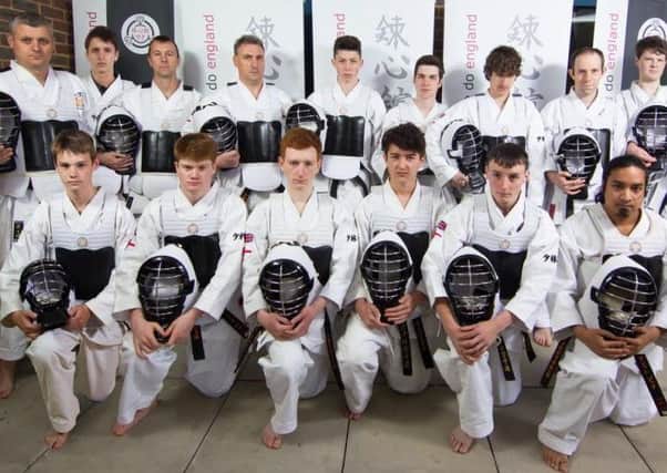 Kumite picture (Sparring Team) - holding helmets. Bottom Row, Left to right  James Porter, Jordan Littlecott, Simon Bosher (all from Burgess Hill), Chris Udell (Haywards Heath), Hal Foster (Ardingly), Ajit Dutta (Haywards Heath). Back Row, Left to right  Martin Hadden (Lindfield), Eddie Entwisle (Ardingly), Marc DonFrancesco (Chelwood Gate), George Howard-May (Haywards Heath), Ollie Lainchbury (Ditchling), Evan Diamond (Ditchling), Geoff Neumann (Stirling, Scotland), Tom French (Haywards Heath), Joe Mellor (Hassocks). Picture Ajit Dutta  Raid Studios