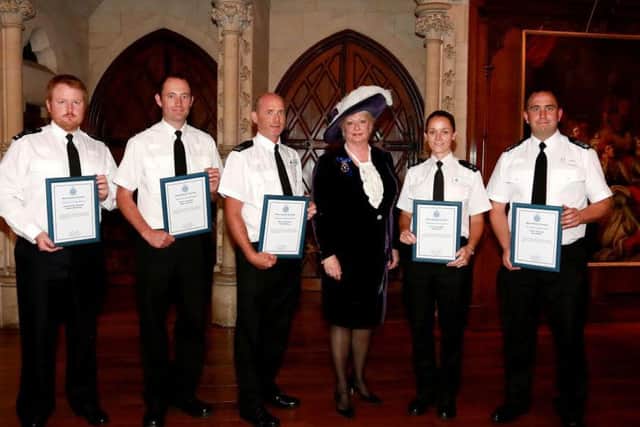 The Sussex Police West Sussex Divisional Awards - receiving their awards from the High Sheriff of West Sussex, Mrs Denise Patterson: PS Roy Hudder, PC Sarah Pack, PC David Phillips, PC Alex Johnston, APS Andrew Buchanan SUS-150722-085300001
