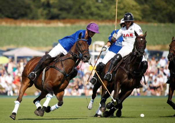 Action from a full-blooded Gold Cup final / Picture by Clive Bennett - www.polopictures.co.uk