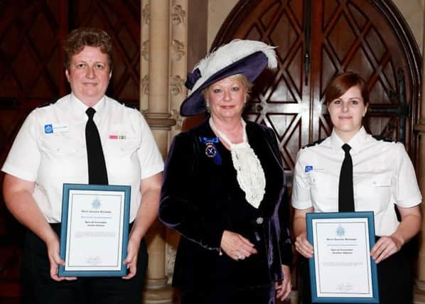 The Sussex Police West Sussex Divisional Awards - Special Constables Heather Gibbons and Jackie Connor receiving their awards from the High Sheriff of West Sussex, Mrs Denise Patterson SUS-150721-175755001