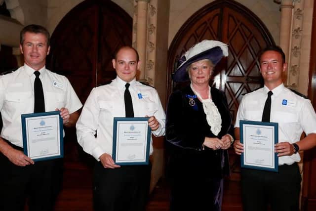 The Sussex Police West Sussex Divisional Awards - receiving their awards from the High Sheriff of West Sussex, Mrs Denise Patterson: Jamie Bennett, Jamie Honywood, Stewart Metcalfe SUS-150722-121331001