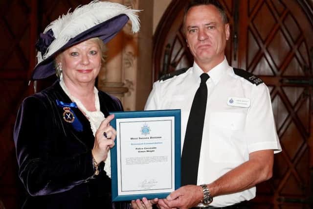 The Sussex Police West Sussex Divisional Awards - receiving his awards from the High Sheriff of West Sussex, Mrs Denise Patterson is Simon Wright SUS-150722-121342001