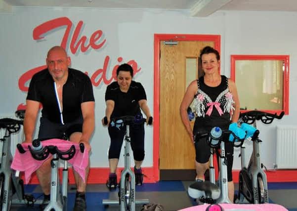 Spinners prepare to take part in a charity fundraising event at a Worthing gym