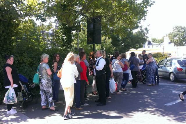 Residents queue to try and get out of the Liverpool Road car park in Worthing SUS-150722-152939001