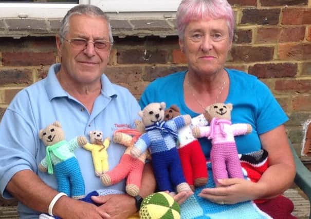 Coco's Foundation supporters Geoff and Ruth Palmer with some of Ruth's knitted creations. Geoff will do a sky dive for the charity - picture submitted