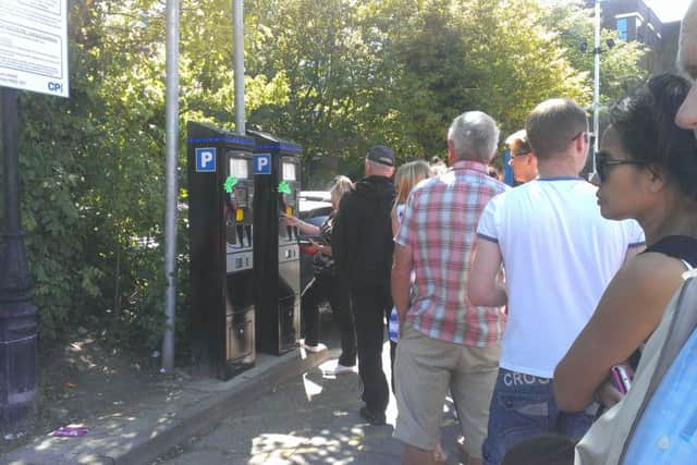 Residents queue to try and get out of the Liverpool Road car park in Worthing SUS-150722-152950001