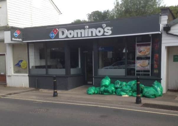 Bags of rubbish left outside Domino's in Pulborough High Street.Photo by Erica Gayler