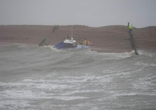 Cabin cruiser runs aground at Winchelsea Beach