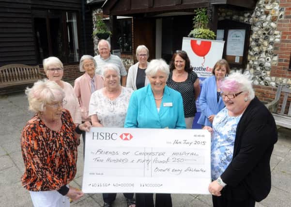 Breathe Easy has donated a cheque for £250 to the Friends of St Richards Hospital
