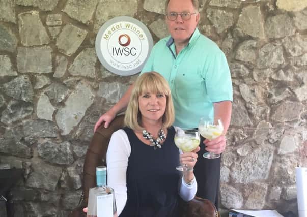 Graham and Gail Woolston, makers of Brilliant Gin, won three awards at the International Wine and Spirit Awards 2015. SUS-150728-170201003