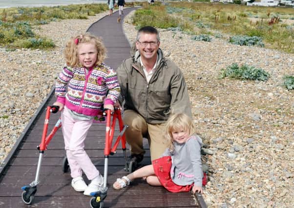 The boardwalk has recently been extended to The Burrells. Pictured are Cllr Ben Stride with his daughters, L-R Darcey Stride (6) and Neely Stride(3)  
Picture: Liz Pearce
