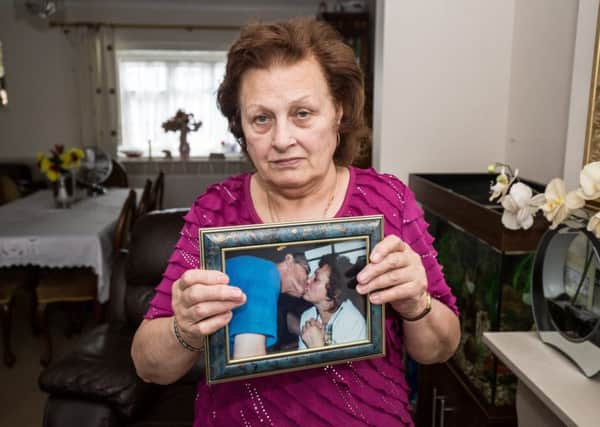 Jean Kinahan with a picture of herself and partner James Burgess. home. PICTURE BY SOUTH WEST NEWS SERVICE
