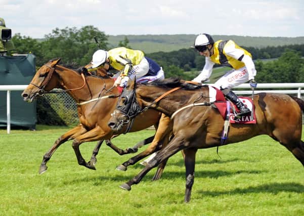 Big Orange and Jamie Spencer get home first in the Qatar Goodwood Cup / Picture by Malcolm Wells