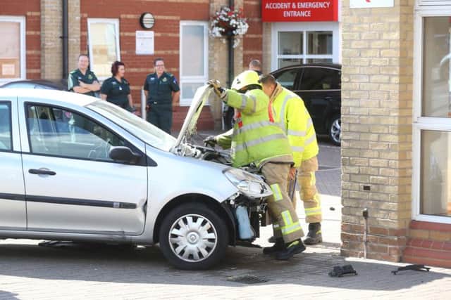 The car crashed into the side of Worthing Hospital. PICS BY EDDIE MITCHELL