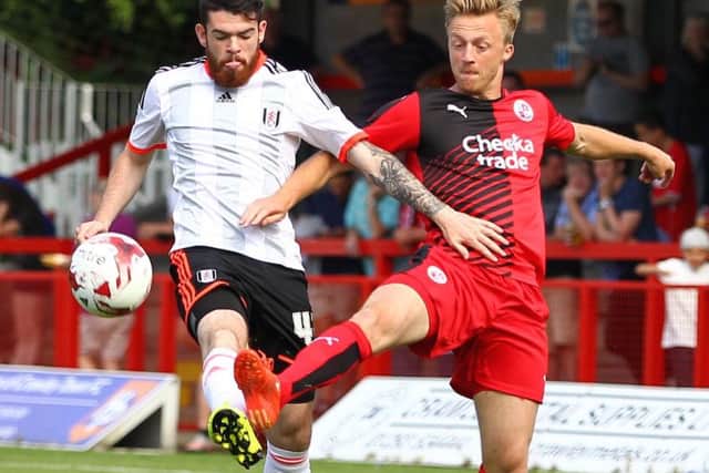 Liam Donnelly, left, in action for Fulham against Crawley Town during their pre-season friendly on July 18, 2015 SUS-150731-165852002