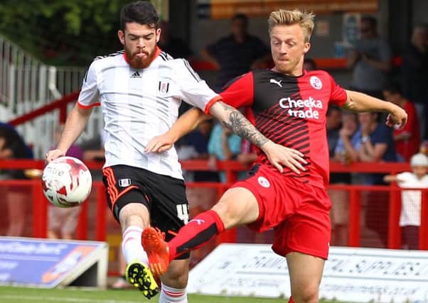 Liam Donnelly, left, in action for Fulham against Crawley Town during their pre-season friendly on July 18, 2015 SUS-150731-165852002