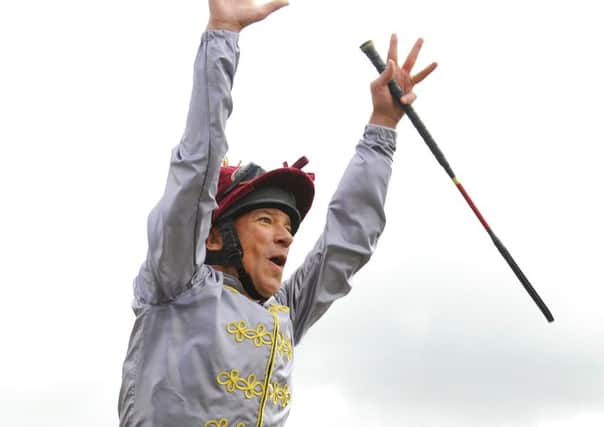 Frankie Dettori flies from his horse - he's performed this four times in four days of the festival / Picture by Malcolm Wells