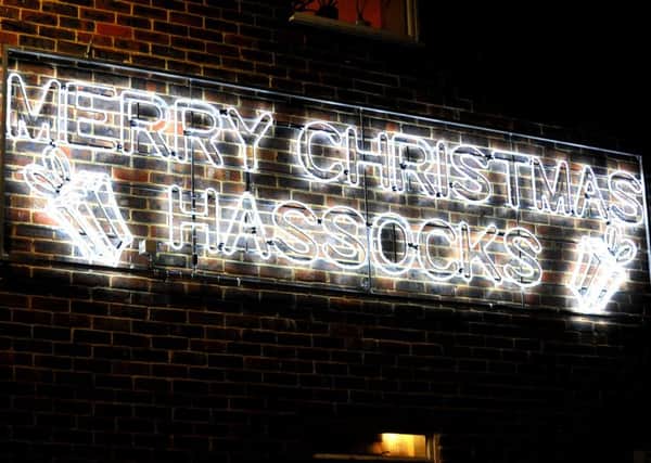 Christmas lights celebrate the festive period in Hassocks. County councillors fear a boundary review 'could split the village in two'.