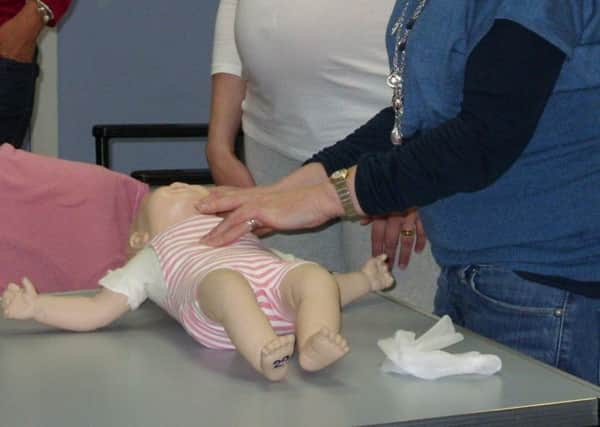 How to perform cardio pulmonary resuscitation (CPR) on an infant under the age of one year