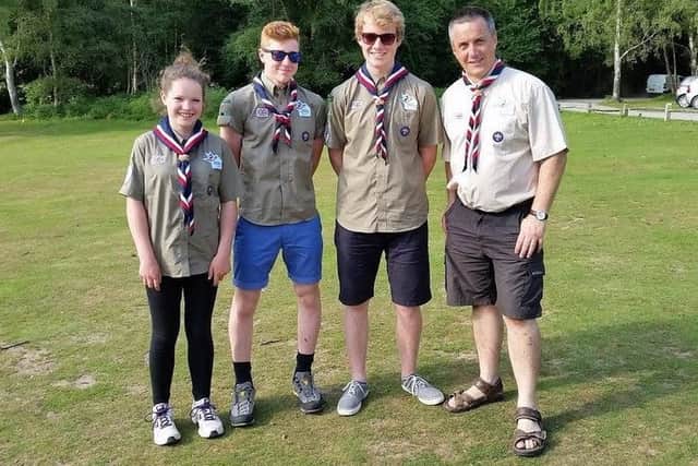 Unit leader Tony Tunnell with Scouts Johanna Wilson, Alex Hole and Adam Long