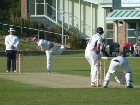 Jed O'Brien bowling for Hastings Priory against Pagham on Saturday. Picture by Simon Newstead (SUS-150208-111604002)