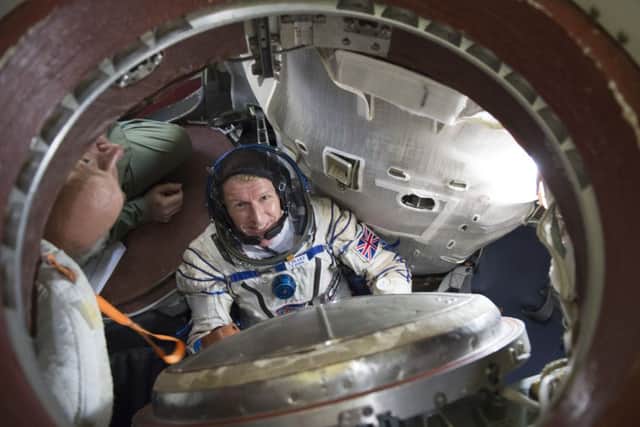 Chichester Astronaut Timothy Peake during training inside the full-scale mockup of the Soyuz capsule, at the Gagarin Cosmonaut Training Centre, in Russia, on 15 October 2014. SUS-141224-104133001