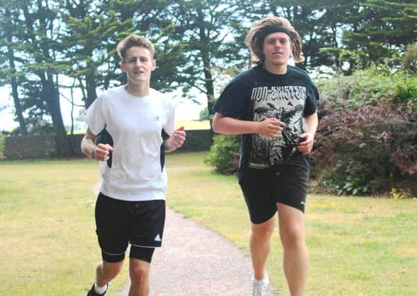 Nick Jones, left, with Daniel Burdfield, both 18. Together, they are tackling the Chestnut Tree House 10k in Littlehampton, next month.