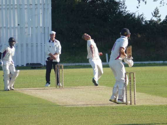 Adam Barton bowling for Hastings Priory against Pagham last weekend. Picture by Simon Newstead (SUS-150208-111428002)
