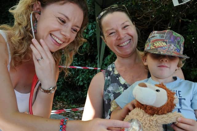Three-year-old Cooper from Steyning has his lion checked out