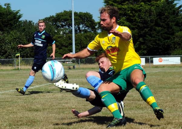 Tom Bayley in action for Sids against Ringmer / Picture by Kate Shemilt