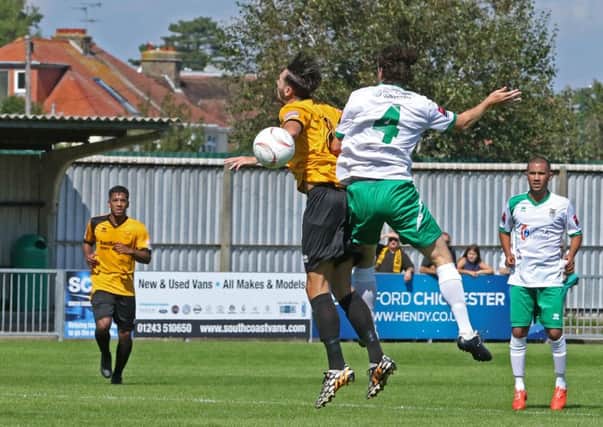 Gary Charman, pictured facing Merstham, was in the side again at Canvey / Picture by Tim Hale