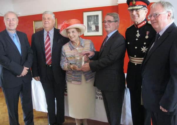 Lord Lieutenant for West Sussex Susan Pyper presents the Queen's Award for Voluntary Service