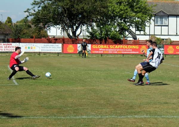 Joe Grommet scores on his debut for Pagham / Picture by Roger Smith