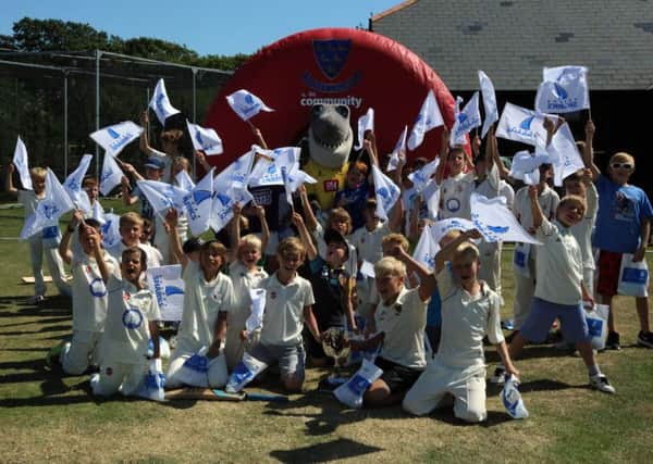 Young cricketers enjoy the fun with Sid the Shark at West Wittering