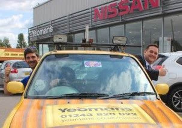 The yellow Nissan Micra donated by Richard Taylor