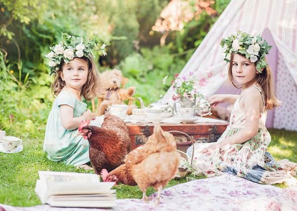 Retired ex-bat hens Biddy & Bussy with youngsters Eva and Eliza, at their Woodland Fairy Tea Party. they are just two of the hens saved by the national charity