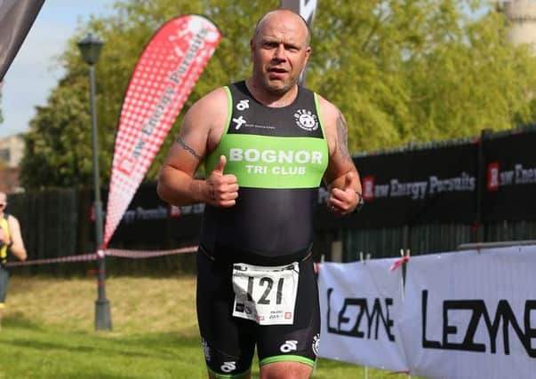 Alan McTernan completing my first ever triathlon in May, as part of his training