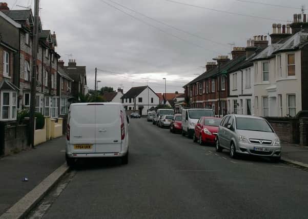 Parked cars line both sides of Highfield Road in Bognor Regis SUS-151108-132012001