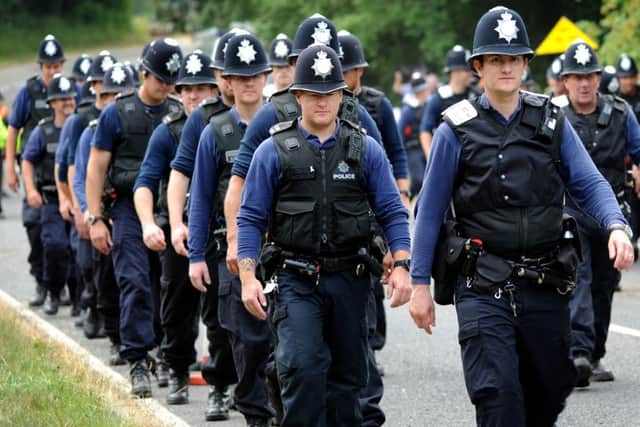 Police at the Balcombe Fracking protest Saturday 27.07.13 after escorting a lorry off the drilling site ENGSUS00120130729104808
