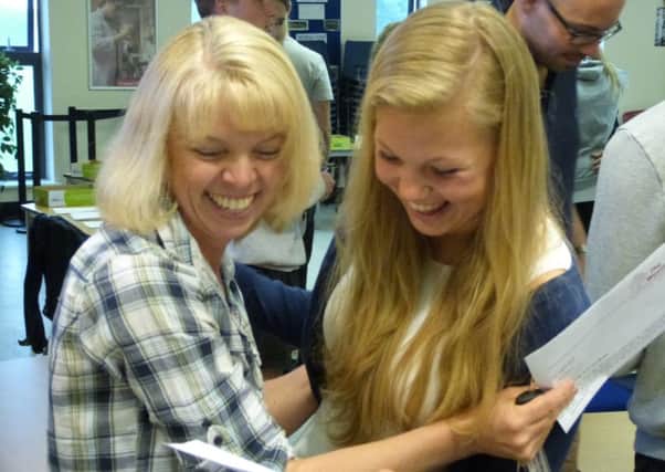 Weald student Amy Sayers celebrates her A-level results with her mum