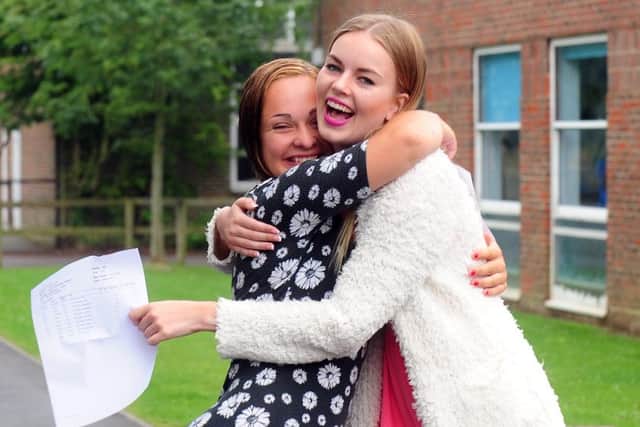 Sophie Williams and Charlotte Smart, both delighted with their grades.ks1500369-5 SUS-150813-152241008