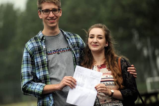 Oxford bound Mark Brookes is congratulated by his sister Lucy who is also studying at Oxford.LA1500173-5