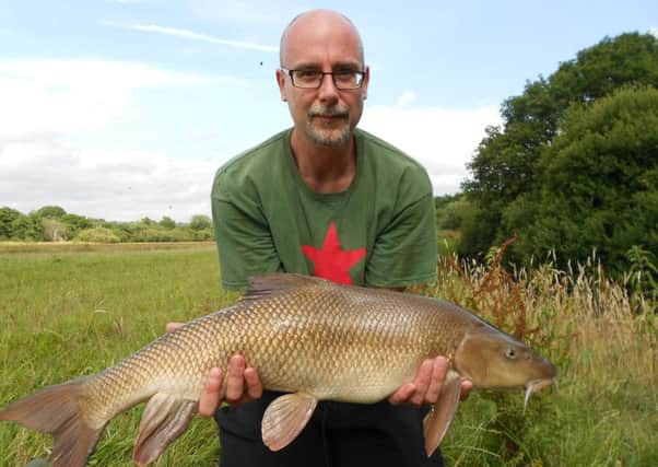 Brian Hooper with his prize barbel at Coultershaw