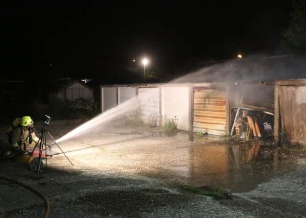 Firefighters tackle a garage fire in Sompting   Picture: Eddie Mitchell