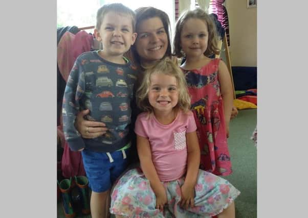 Assistant manager Lauren with pupils at Southwater Montessori Nursery.