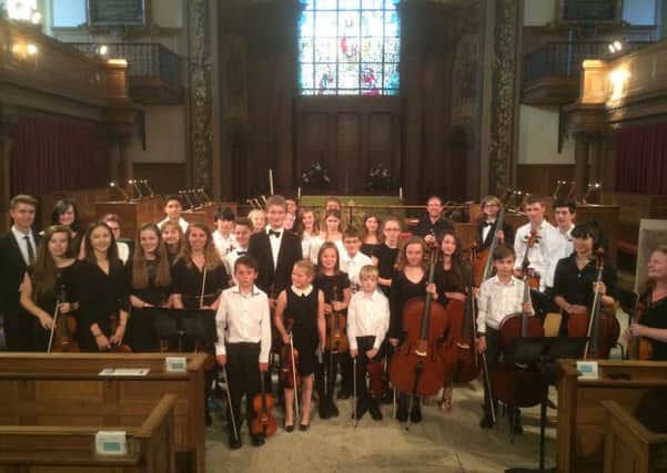The young and talented violin players of Sussex SUS-150817-170650001