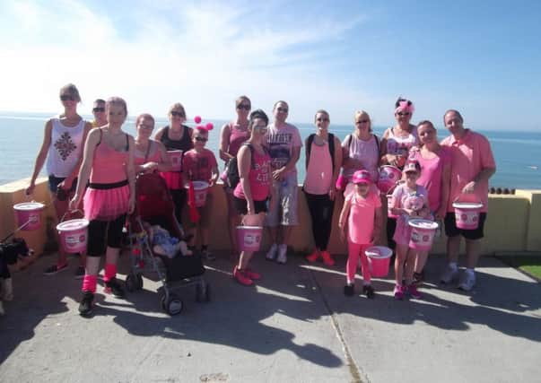 People walked from Hastings to Cooden Beach for the breast cancer charity Tickled Pink.