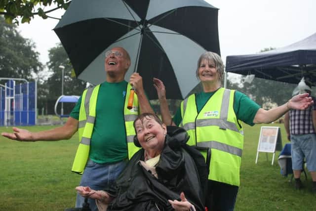 Organiser Norah Fisher with Colin and Gill Dean. Photo by Derek Martin DM153580a