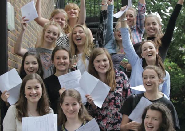 Girls celebrating their A level results